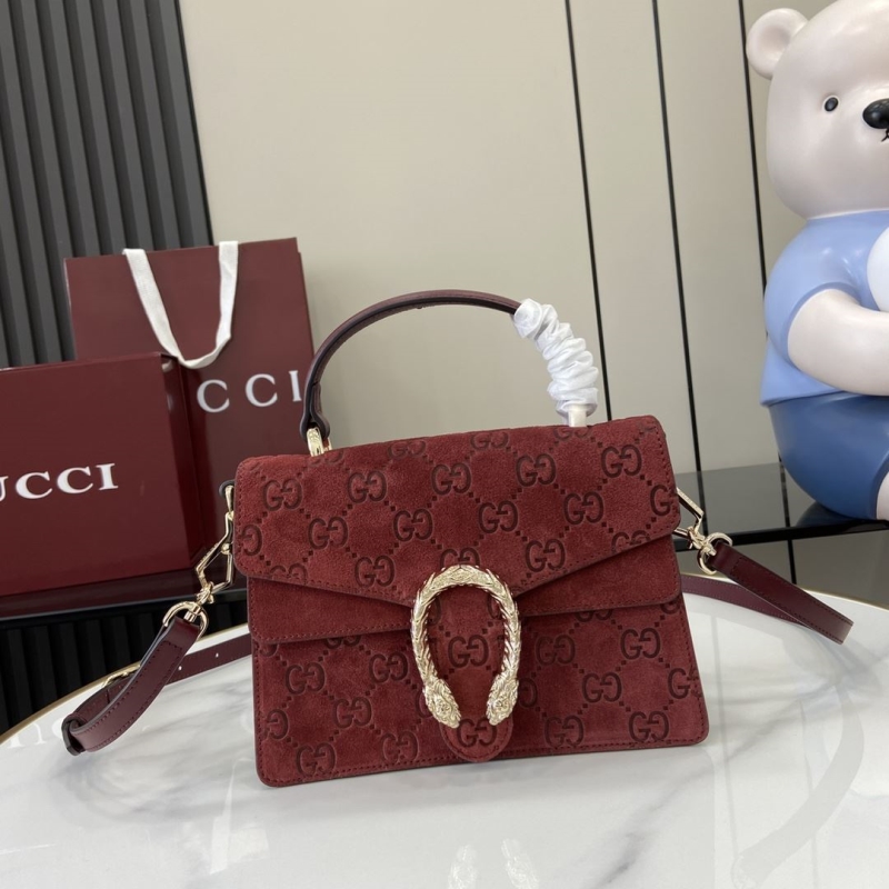 G*u*i top handle bags